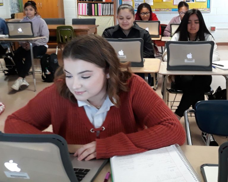 Groves High students receive Apple laptops, prep for computer jobs