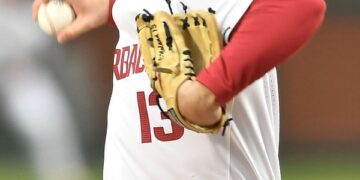 Arkansas pitching to strengths early
